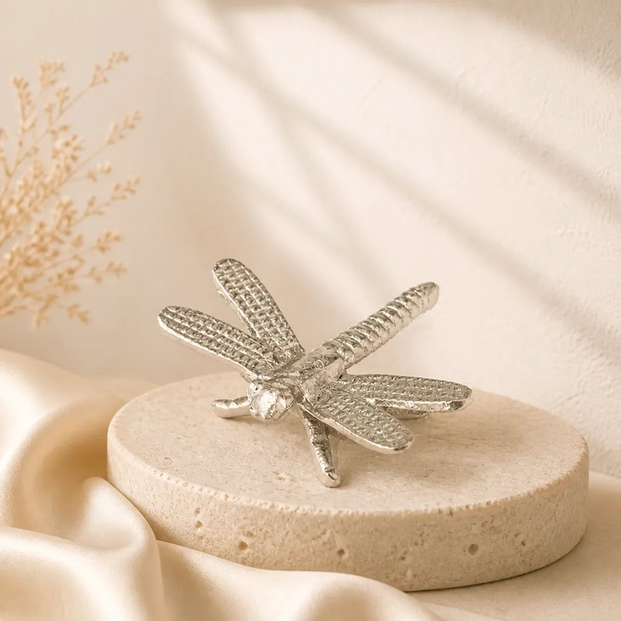 Silver dragonfly room decoration styled on natural stone — PJ Luxe