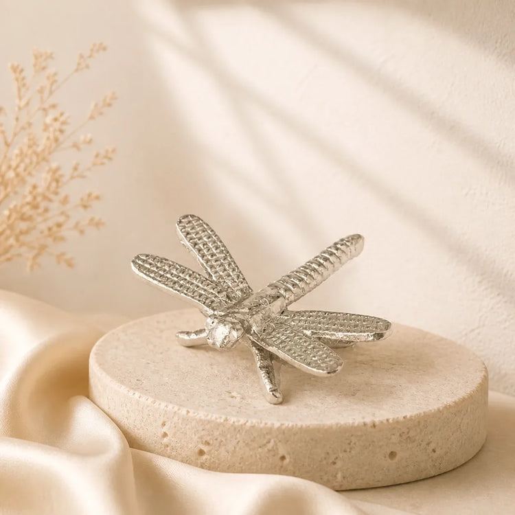 Silver dragonfly room decoration styled on natural stone — PJ Luxe