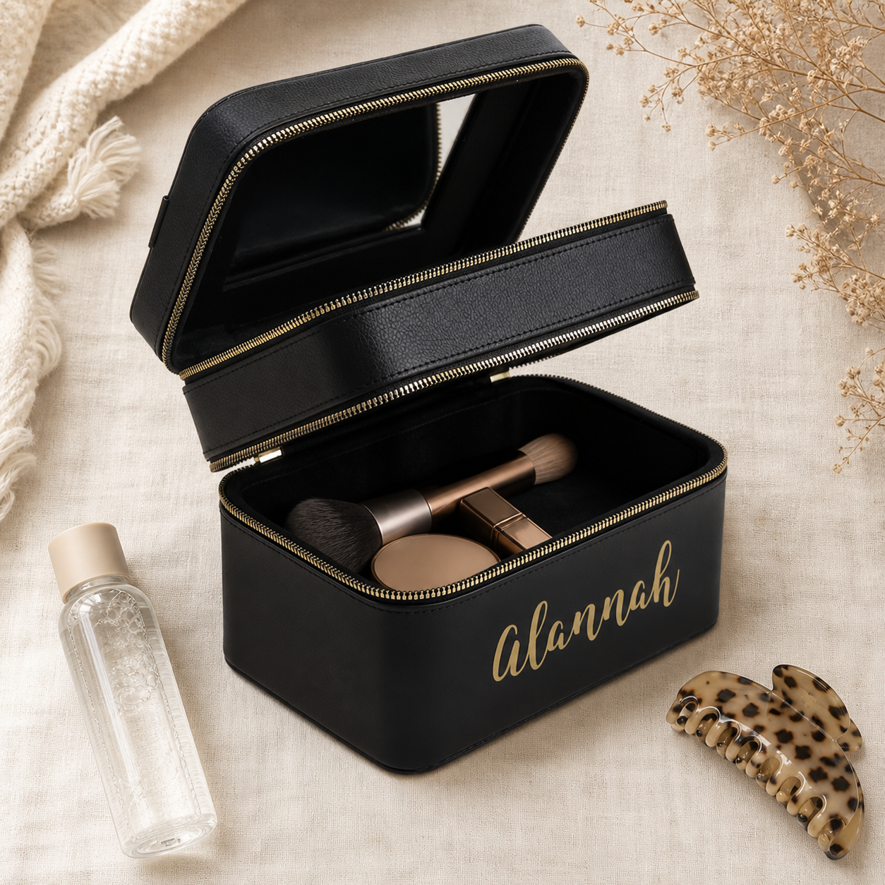 Open PJ Luxe black personalised travel makeup case with Alannah name and travel beauty essentials