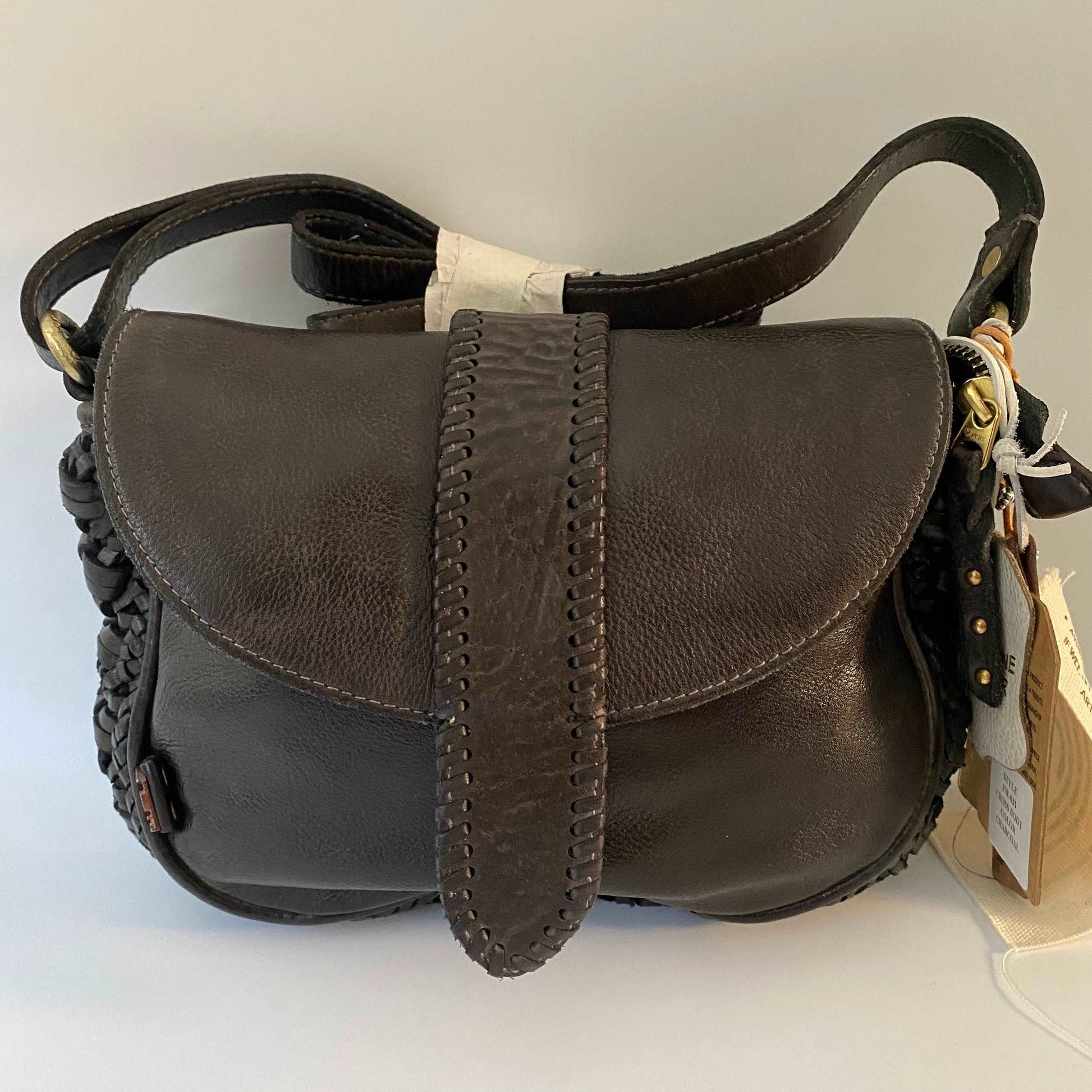 Art N' Vintage Gabby charcoal leather handbag with braided sides and hand-stitched details, embodying timeless elegance with a touch of vintage character.