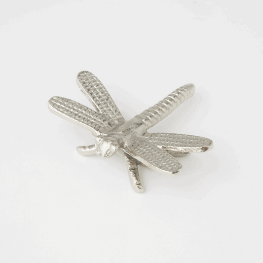 Small silver dragonfly decoration designed for enhancing room aesthetics, featuring intricate detailing on its wings and body to mimic the elegant appearance of a real dragonfly.