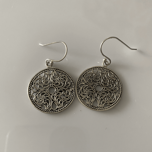 Sterling Silver Filigree Round Drop Earrings, featuring exquisitely detailed filigree work in a round, open design, hanging elegantly from silver hooks. These earrings blend traditional craftsmanship with timeless style, ideal for adding a touch of sophistication.