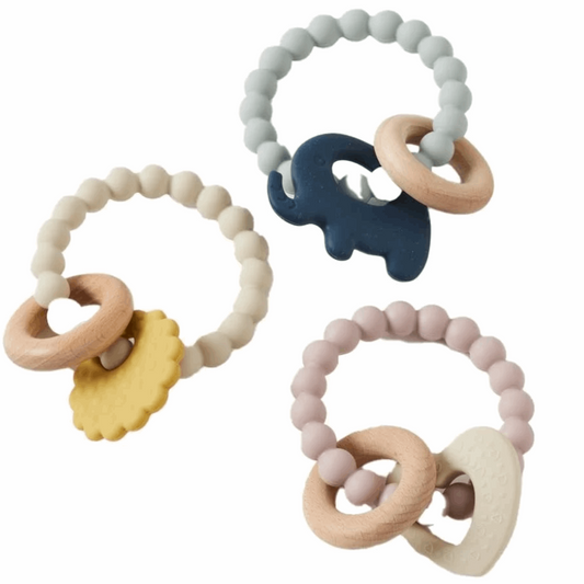 Natural and safe Mika Silicone & Wood Teether, featuring a combination of soft, BPA-free silicone beads and smooth, untreated wooden rings. Designed for soothing gums and promoting sensory development in infants.