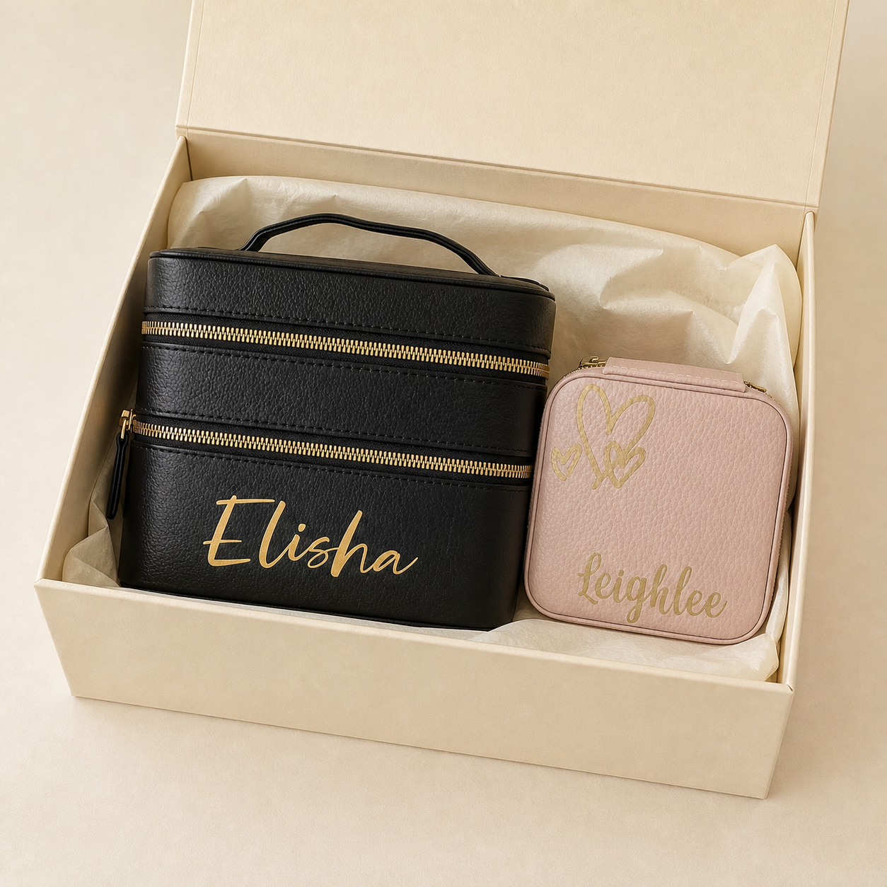 Personalised travel makeup and jewellery case duo presented in an open ivory gift box