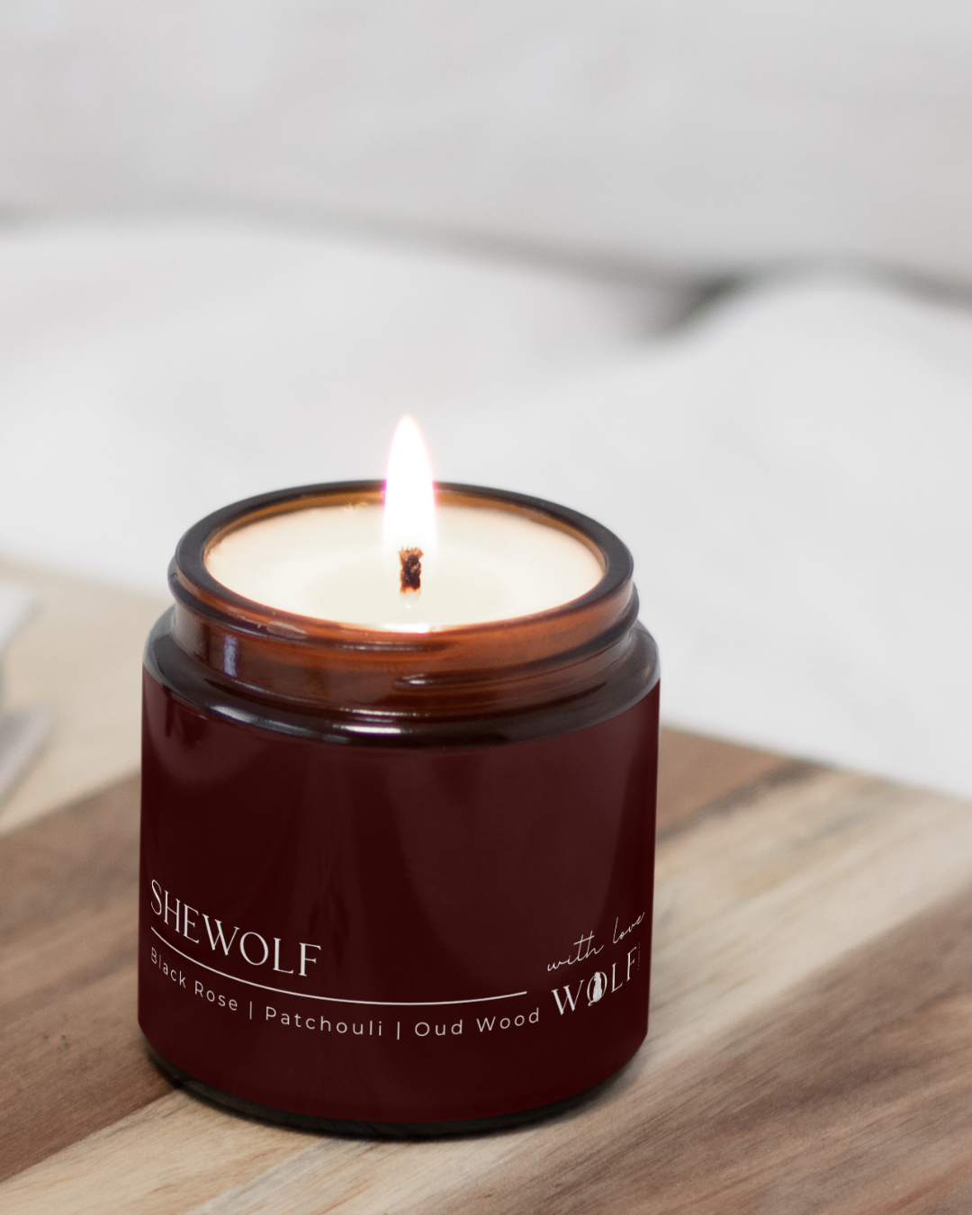Shewolf candle styled in a sophisticated home setting